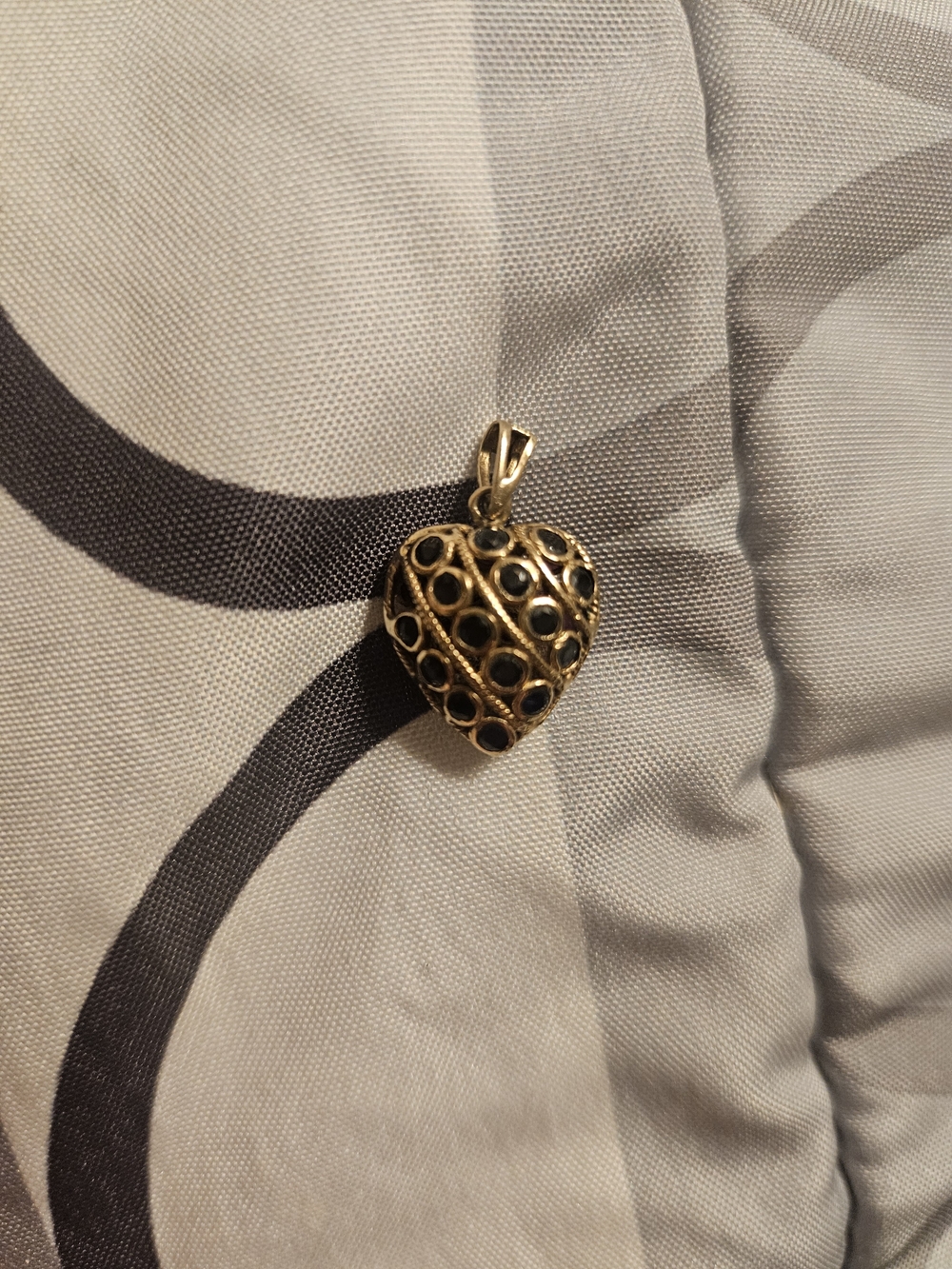Gold Heart Pendant with Black Accents